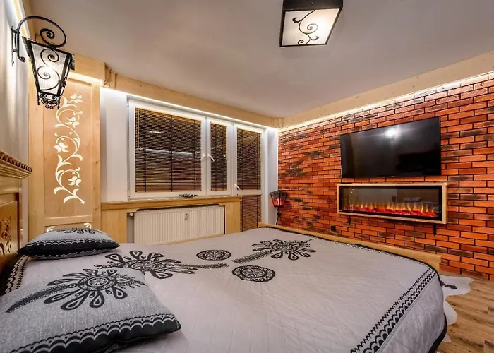 Apartament Zakopane utrzymany w stylu góralskiej chaty | 2★